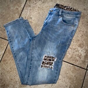 BEBE Light Blue Jeans with Leopard Print and Rhinestone Details